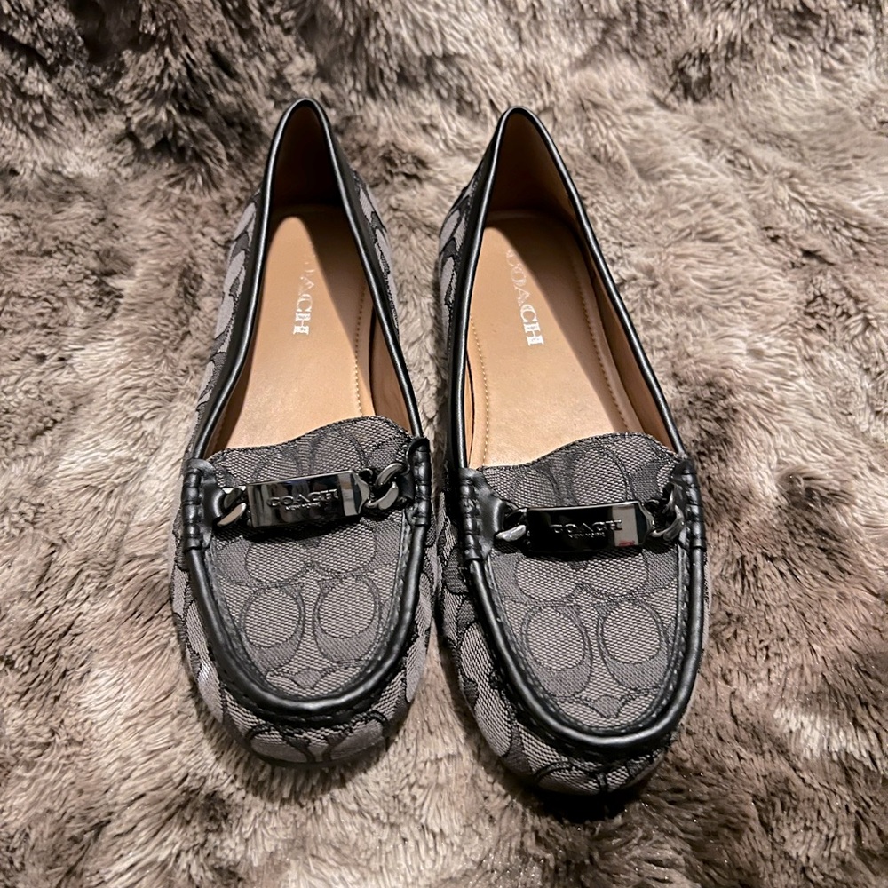 Coach loafers with black C’s.